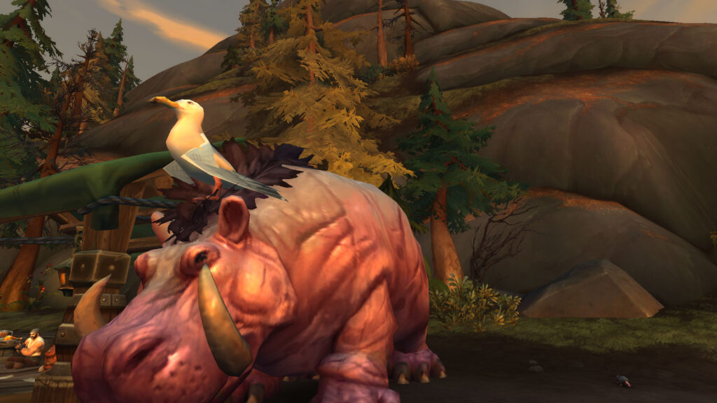 WoW a seagull is sitting on the head of a hippo